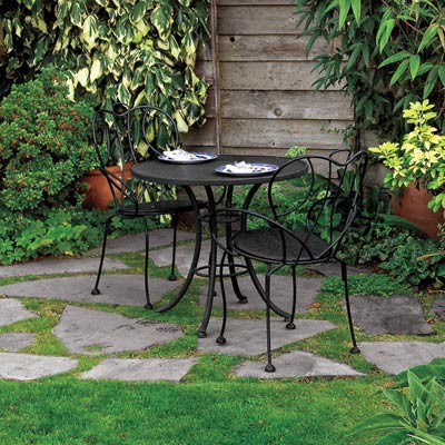 a patio with a small, outdoor table
