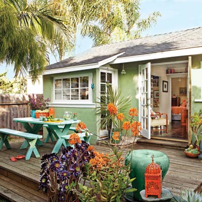 a deck with cheery colors and flowers