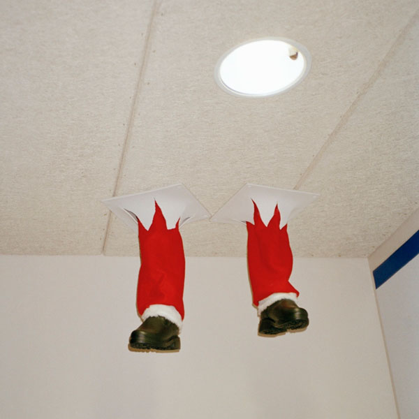 Santa Claus feet sticking through ceiling