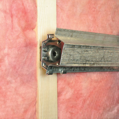 tool identified as a GenieClip sound-reducing fastener