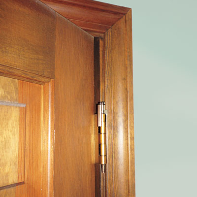 tool identified as a hinge-mounted door-friendly doorstop 