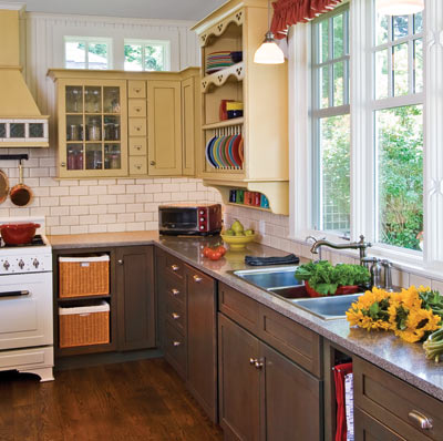 colorful kitchen with 1920s details like subway tile, wood floor and beadboard ceiling