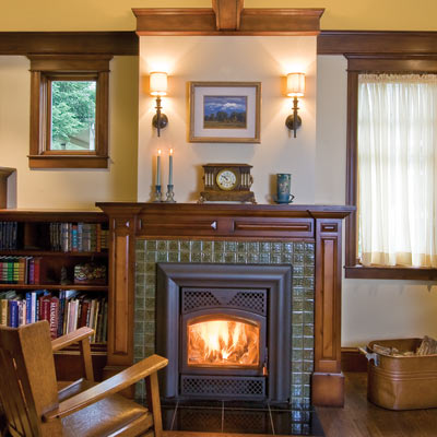 fireplace with mahogany mantel and ceramic tile 