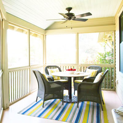 table and chairs in screen-in porch 