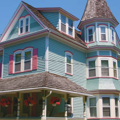 blue house with pink trim 