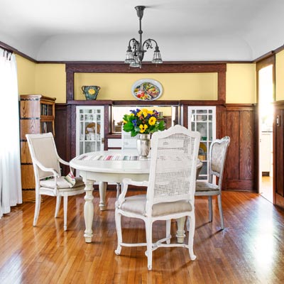 bungalow house living space with original built-ins, wainsocting, cove ceilings 