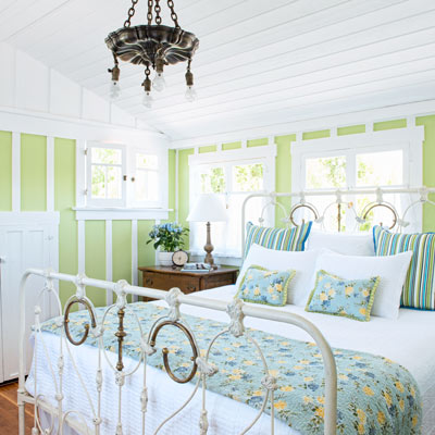 bungalow house master bedroom with tongue-and-groove ceiling, knee-wall storage