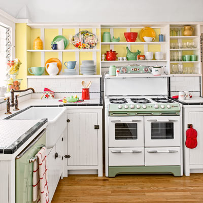 bungalow house kitchen with 1950s O'Keefe [AMP] Merritt stove, salvaged-beadboard doors