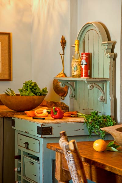 freestanding butcherblock prep area in open kitchen in cottage whole house remodel 