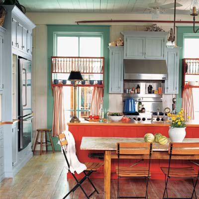 colorful cottage-style kitchen with antiques rustic furniture