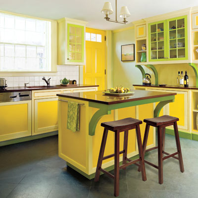 bold colors in yellow and green shades of equal intensity add life to this vibrant kitchen
