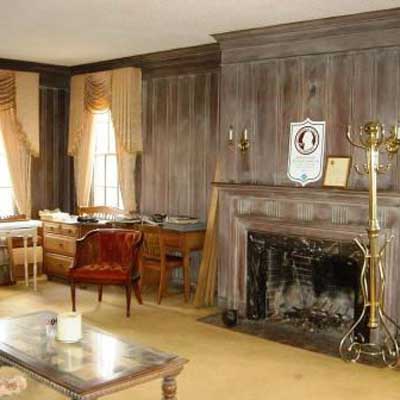 Wood Paneling Is Left Natural: Before from Best Living Spaces Before and Afters 2012