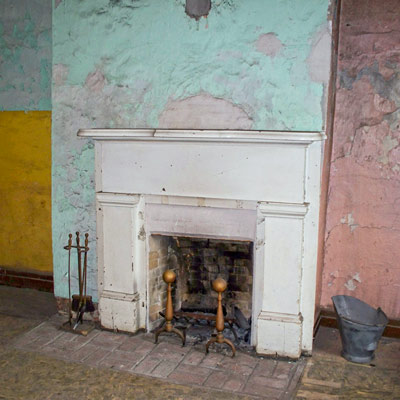 front parlor with original mantelpiece in save this old house lexington, missouri greek revival 