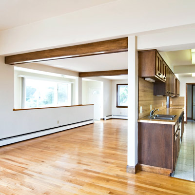 before remodel galley style kitchen close off from rest of space by a wall