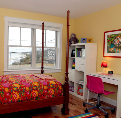 girl's bedroom in above-the-garage addition in remodeled Cape Cod