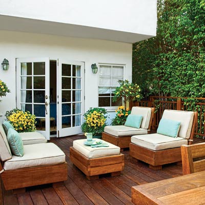 backyard wood deck with French doors, seating area