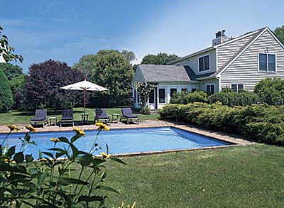 backyard swimming pool and screened porch