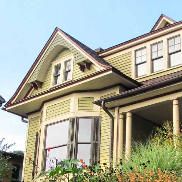 curb appeal boost on budget queen anne style home with multicolor scheme