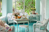 upgrade outdoor room porch with bluegreen walls and floor, white ceiling, vintage-style furniture