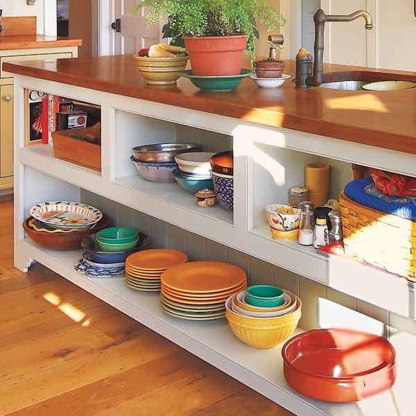 kitchen island with open storage for mixing bowls, dishes