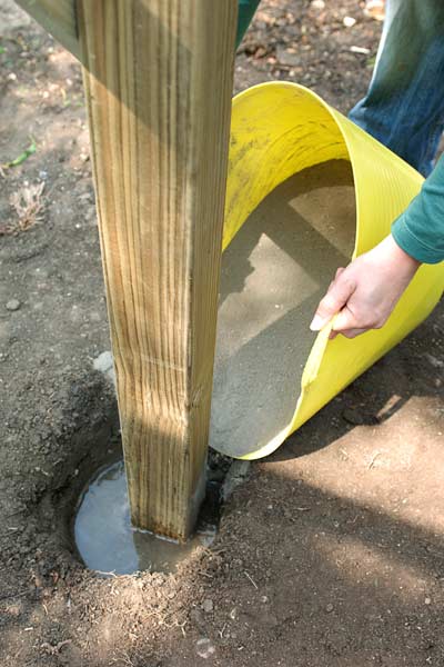 DIY calorie burners woman building a fence