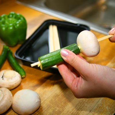 Chopsticks used as skewers for grilling vegetables 