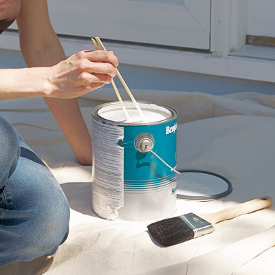 Chopsticks used to stir paint