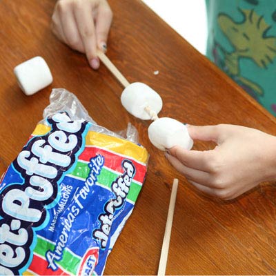 Chopsticks used to skewer marsh-mallows