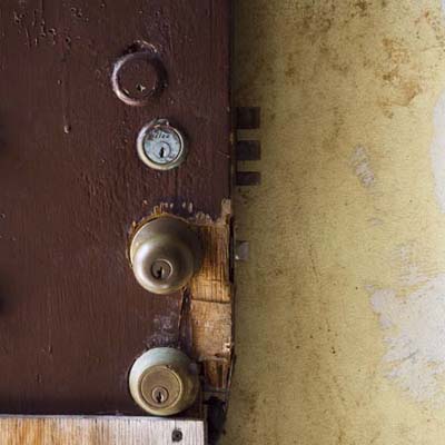 Roxbury, MA door with pleanty of locks on it