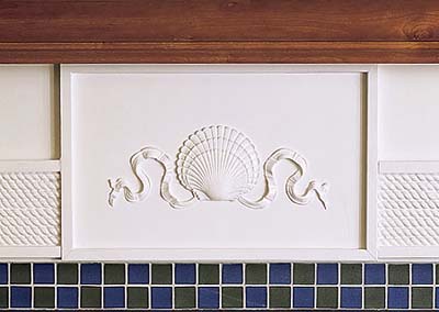 sandblasted fireplace surround tile in new Shingle-style house