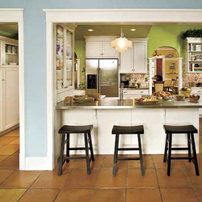 terra-cotta floor tiles in a newly remodeled kitchen