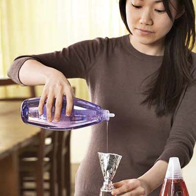 aluminum foil makes a sturdy convienient funnel