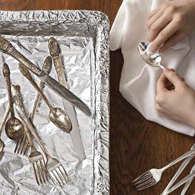 soak your silver in an aluminum foil-lined pan with baking soda and water to make your shine