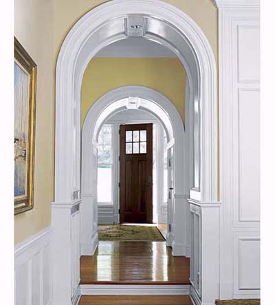arched moldings framing door
