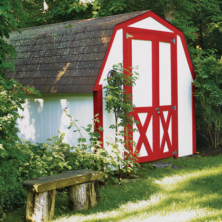 white garden shed with red trim