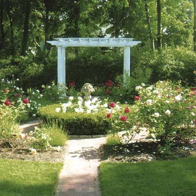 after photo of a back yard in Newburyport, MA with a pergola and period look