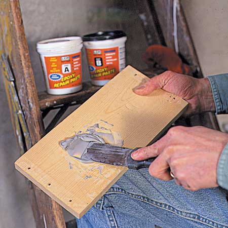 mixing together the 2 part epoxy crack sealer