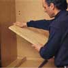 Build up the height of the main utlility cabinet with plywood