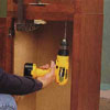 Clamp and join the bookcase to the wall unit with drill