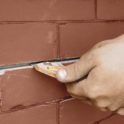 raking out bed joints in brick