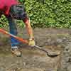 excavate by digging out the topsoil