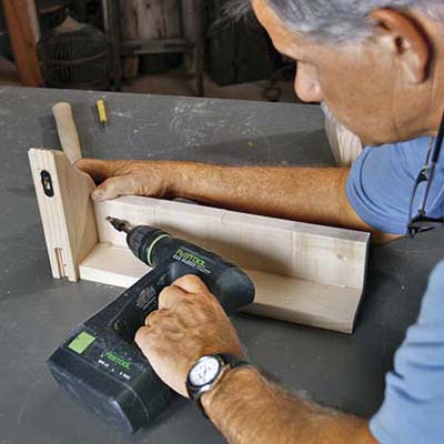 attach first bracket to rosette assembly