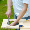 this old house editor mark powers using a rasp to ease the freshly cut dish holes