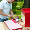 this old house editor mark powers painting the wooden box red both inside and out
