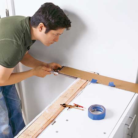 use a combination square to adjust the cardboard to the correct depth