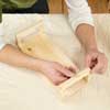 hands working with wood and glue
