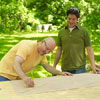 two men preparing materials to make shishkaball game