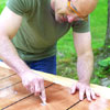 people applying the point graphics while building a ricochet game board