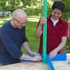 two men bolting stand together for ladder golf game set