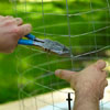 man creating wire cylinder for shishkaball game